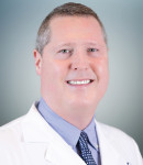 RUSSELL S BRUMMETT, M.D.